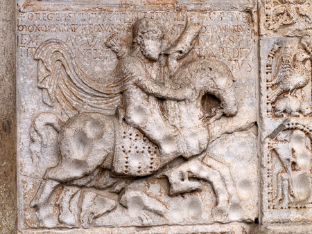 The San Zeno Basilica Church in Verona Italy, detail of exterior sculptures and bas reliefの写真素材