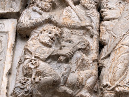 The San Zeno Basilica Church in Verona Italy, detail of exterior sculptures and bas reliefの写真素材