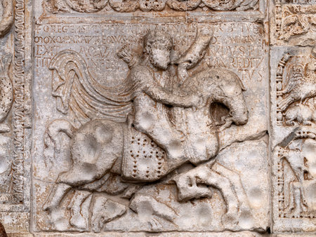 The San Zeno Basilica Church in Verona Italy, detail of exterior sculptures and bas reliefの写真素材