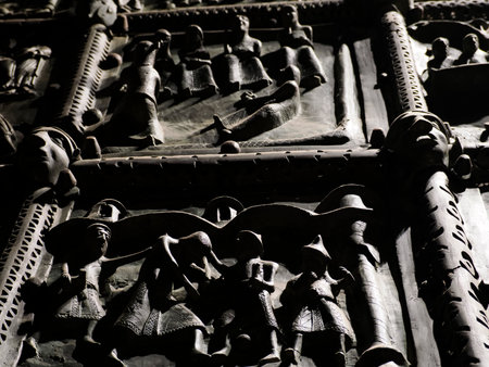The San Zeno Basilica Church in Verona Italy, detail of exterior Iron door sculptures and bas reliefの写真素材