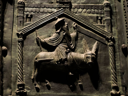 The San Zeno Basilica Church in Verona Italy, detail of exterior Iron door sculptures and bas reliefの写真素材