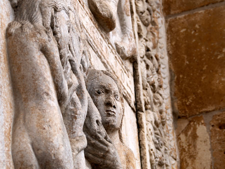 The San Zeno Basilica Church in Verona Italy, detail of exterior sculptures and bas reliefの写真素材