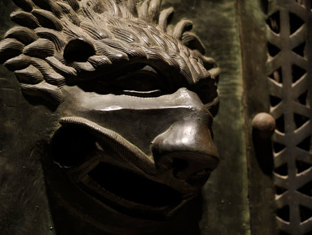 The San Zeno Basilica Church in Verona Italy, detail of exterior Iron door sculptures and bas reliefの写真素材
