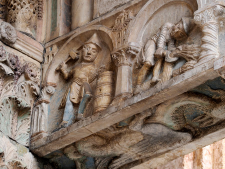 The San Zeno Basilica Church in Verona Italy, detail of exterior sculptures and bas reliefの写真素材