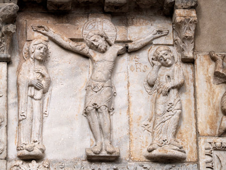 The San Zeno Basilica Church in Verona Italy, detail of exterior sculptures and bas reliefの写真素材