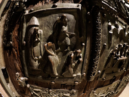 The San Zeno Basilica Church in Verona Italy, detail of exterior Iron door sculptures and bas reliefの写真素材