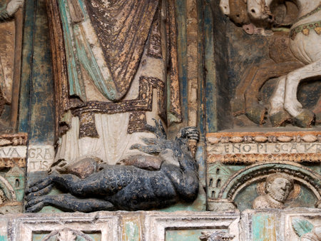 The San Zeno Basilica Church in Verona Italy, detail of exterior sculptures and bas reliefの写真素材