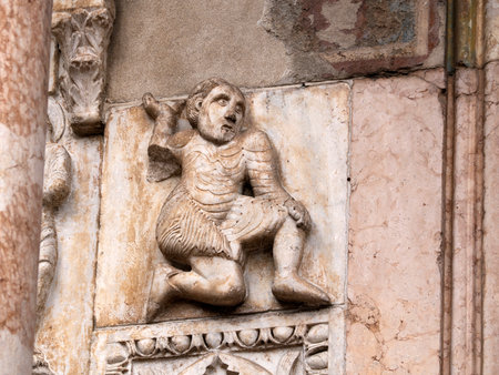 The San Zeno Basilica Church in Verona Italy, detail of exterior sculptures and bas reliefの写真素材
