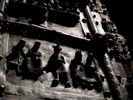 The San Zeno Basilica Church in Verona Italy, detail of exterior Iron door sculptures and bas reliefの写真素材