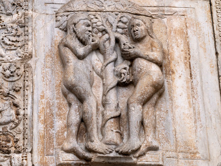 The San Zeno Basilica Church in Verona Italy, detail of exterior sculptures and bas reliefの写真素材
