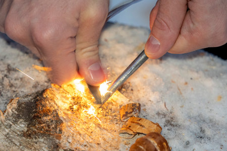 light the fire with the steel firesteel sparkles in lapland in winter detail