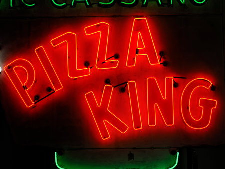 A Pizza King old neon tube detail sign close upの写真素材