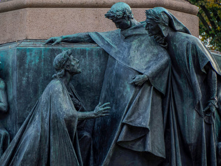 The Dante Alighieri Statue in Trento townの写真素材