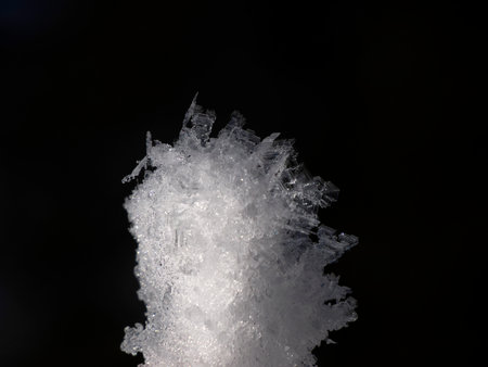 Snow crystals snowflakes detail close up in winter season macroの写真素材