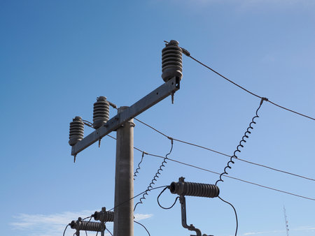 high-voltage insulator electric current ac wires detail close upの写真素材