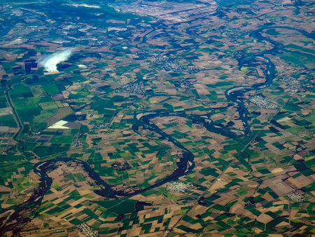 farmed fields river aerial view from airplaneの写真素材