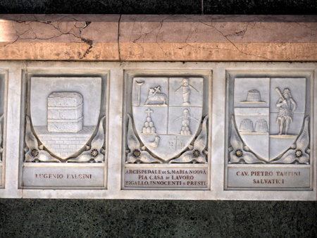 Florence dome church cathedral exterior detail of donors and family shieldの写真素材