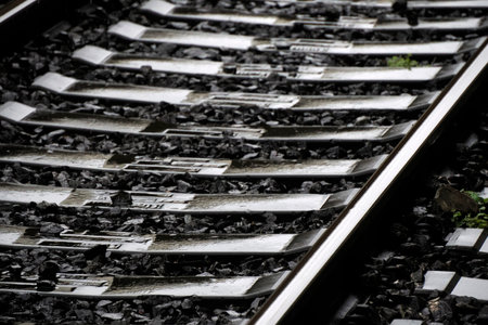 railroad train under the rain detail close upの写真素材