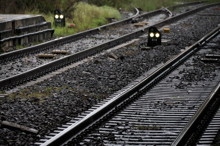 railroad train under the rain detail close upの写真素材