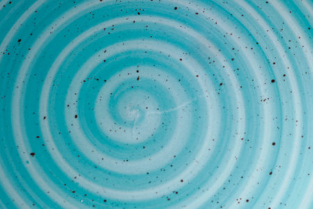 A blue spiral design ceramic detail close up.の写真素材