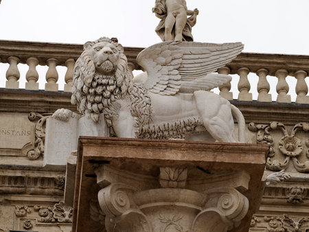 winged san marco lion in verona piazza delle erbe place square italy detailの写真素材