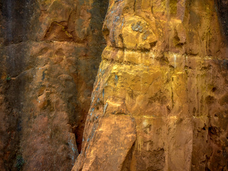 Detail of colored rocks in the Ocher canyon valley massif in Provence France Rousillon area