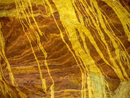 Detail of colored rocks in the Ocher canyon valley massif in Provence France Rousillon areaの写真素材