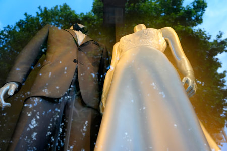 A bride luxury white dress in an atelier windowの写真素材