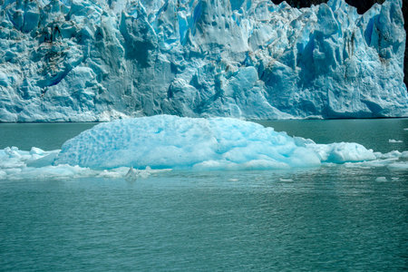 light blue iceberg detail near while cruising to spegazzini glacier los glaciares park Argentine...
