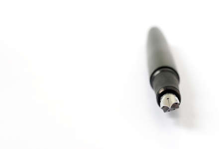 Fountain pen over white backgroundの写真素材