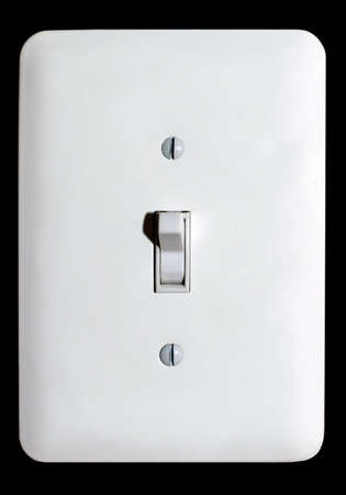 Light switch over black backgroundの写真素材