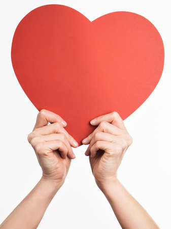 Hands holding heart shapeの写真素材