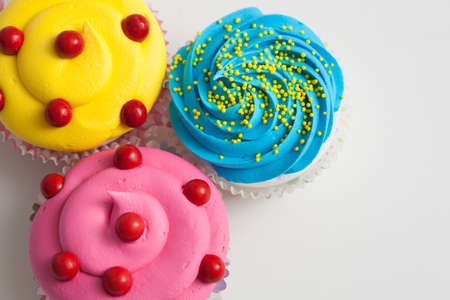 Colorful decorated cupcakes closeupの写真素材