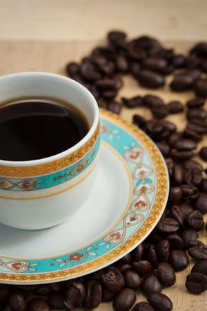 Coffee cup with coffee beanの写真素材
