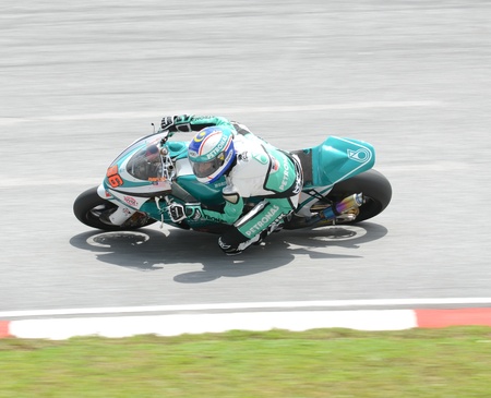 SEPANG, MALAYSIA - OCTOBER 21: Petronas team rider of 250cc race at Malaysian MotoGP 2011 Sepang International Circuit Malaysia on October 21, 2011 in Sepang, Malaysia. のeditorial素材