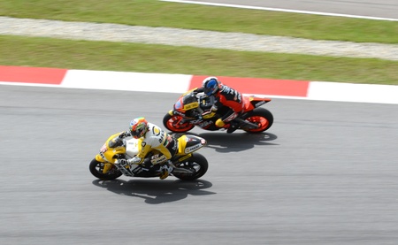SEPANG, MALAYSIA - OCTOBER 21: Riders of 250cc race at Malaysian MotoGP 2011 Sepang International Circuit Malaysia on October 21, 2011 in Sepang, Malaysia. のeditorial素材