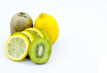 Kiwi and lemon isolated on whiteの写真素材