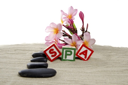 Spa concept with  frangipani, stones and sand の写真素材