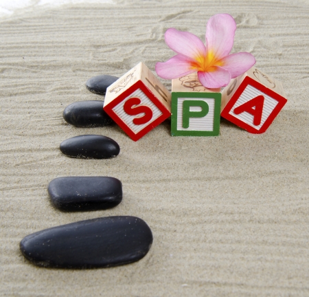 Spa concept with  frangipani, stones and sand の写真素材