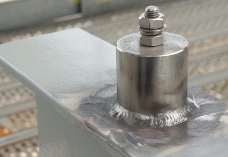 Stainless steel attached on carbon steel as function for earthing point with bold and nut  For oil and gas industries の写真素材