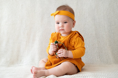 Little cute Baby girl playing with teething beads