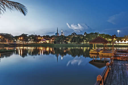 Architecture reflection on lake in blue hourの写真素材