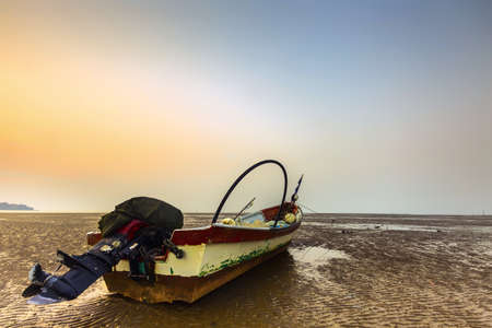 The fisherman boat at hazy morningの写真素材