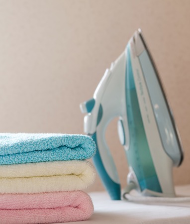 close up of iron and multicolor towels, houseworkの写真素材