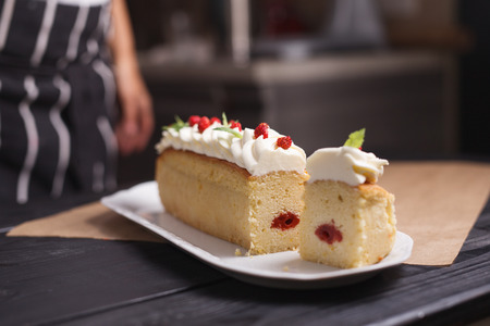 cupcake filled with decorated with berries and cheese creamの写真素材