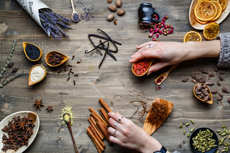Different spices, herbs and roots view from the topの写真素材