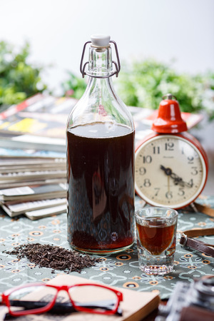 coctail in glassy bottle and glassの写真素材