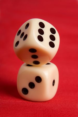 Dice cup and dice on backgroundの写真素材