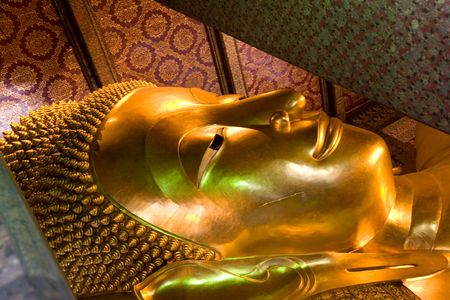 
The reclining Buddha at Wat Pho in Bangkok, Thailand. Largest reclining Buddha in the world.の写真素材