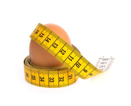Egg with meter on white